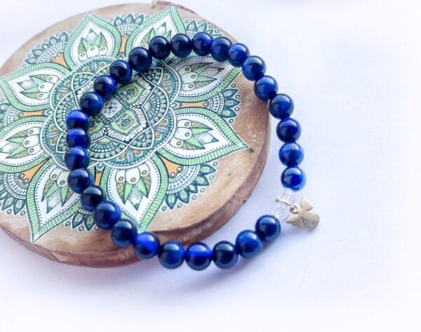 Bransoletka z tygrysiego oka z przywieszką aniołka